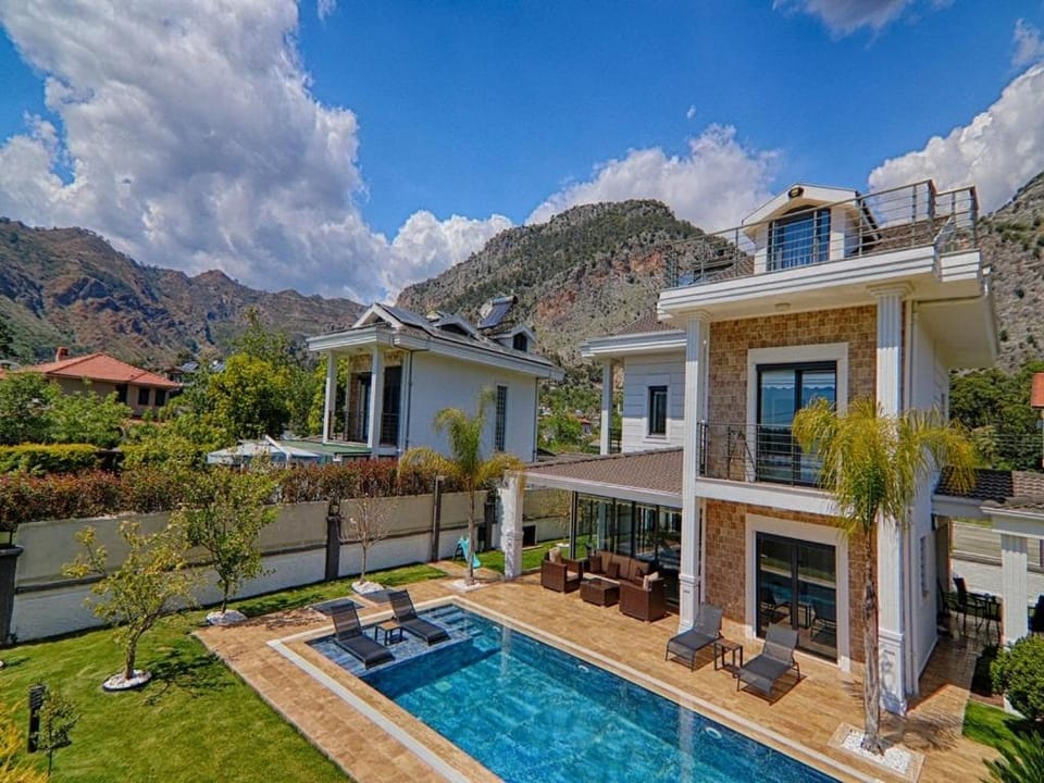 Property building, Natural landscape, Garden, Swimming pool
