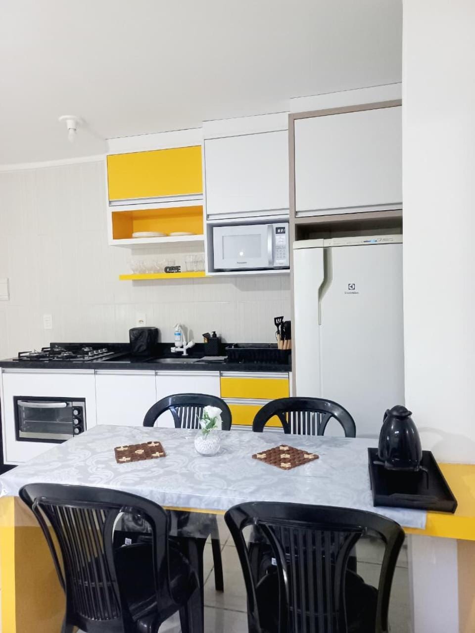 Dining area, microwave, oven, stove, kitchen