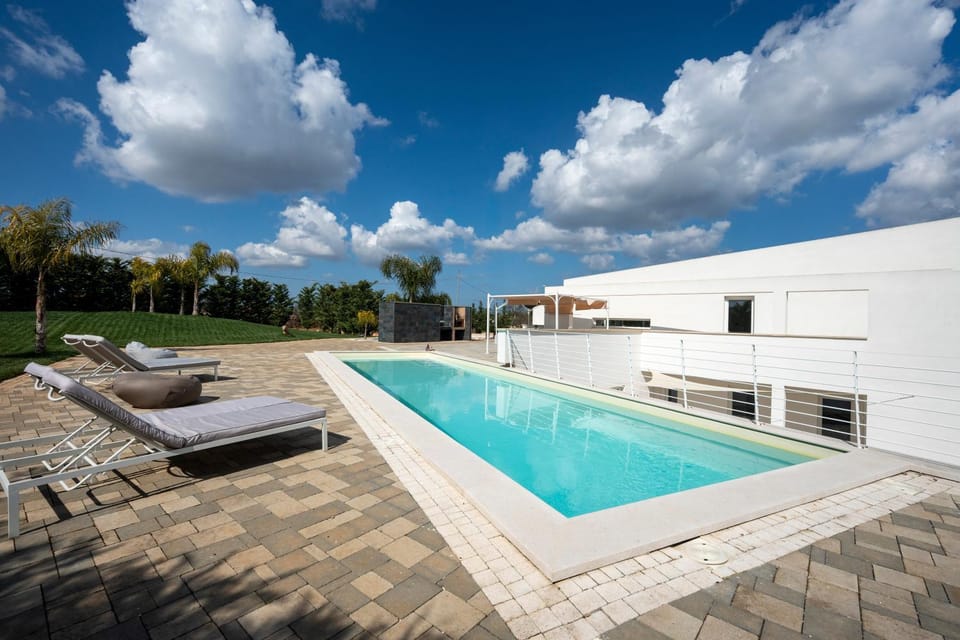 Property building, Living room, Swimming pool