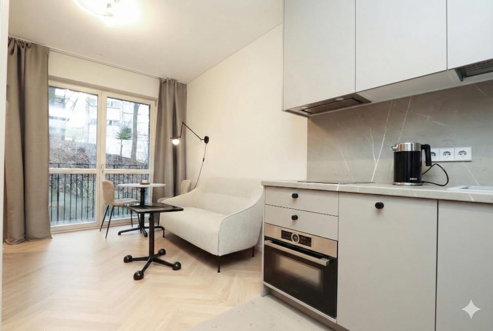 New Cozy Designer Apartment in Uzupis Walk to Old Town in a Luxury Building Garden View Balcony Apartment in Vilnius