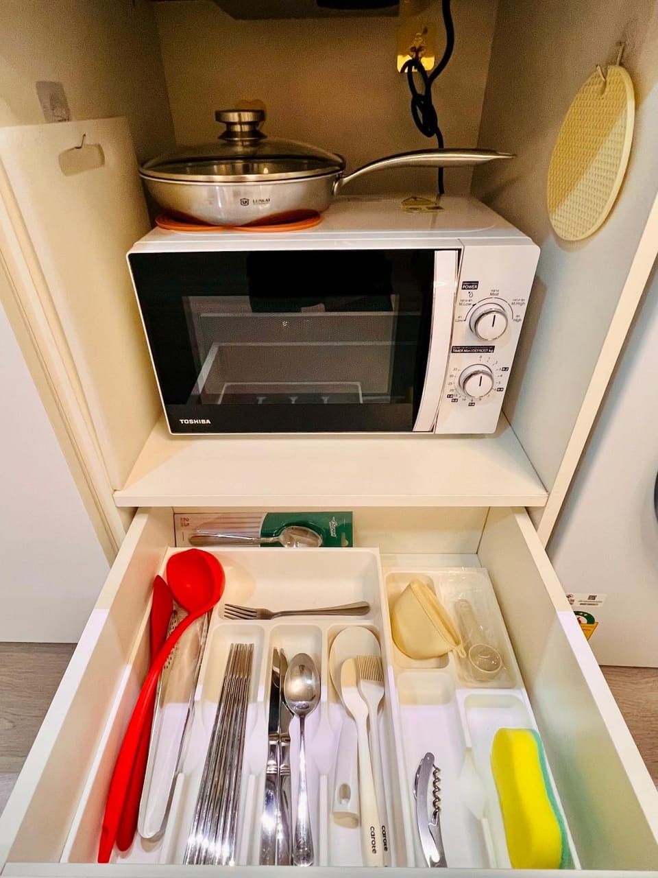 Kitchen or kitchenette, microwave