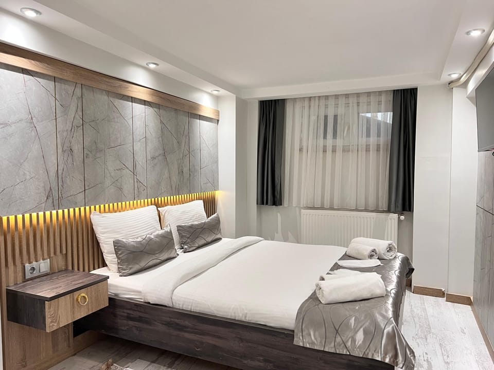 Bed, Photo of the whole room, Bedroom, towels, air conditioner