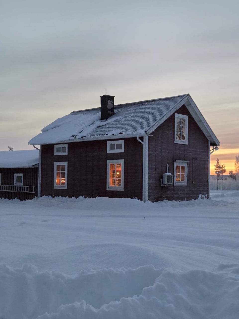 Tvåvåningshus i lantlig miljö House in Norrbotten County, Sweden