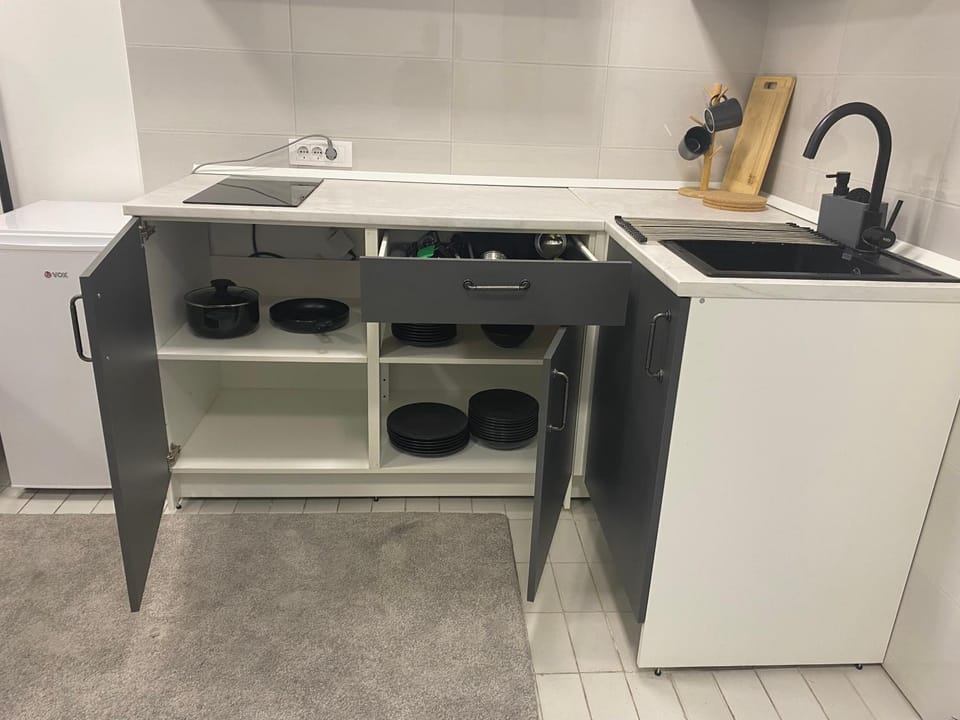 Kitchen or kitchenette, stove