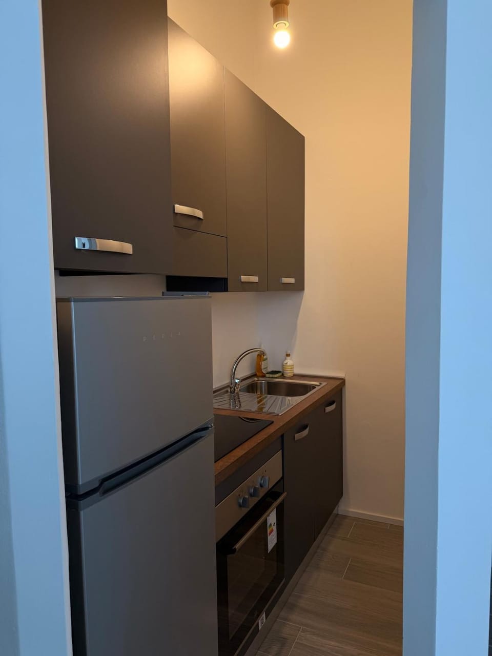 Kitchen or kitchenette, oven, stove