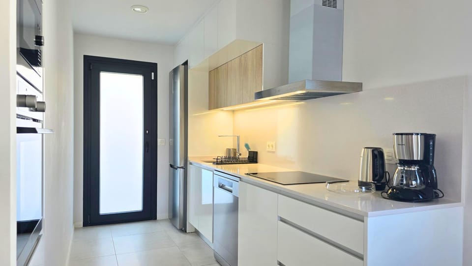 Kitchen or kitchenette, microwave, stove, kitchen