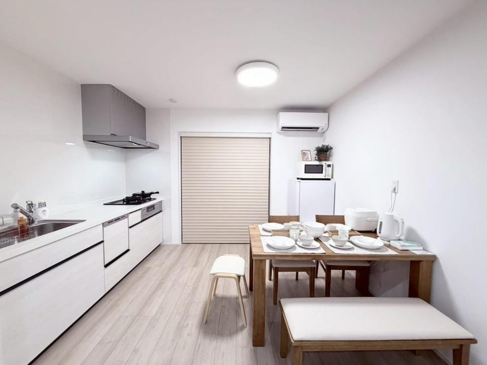 Kitchen or kitchenette, Dining area, stove, air conditioner