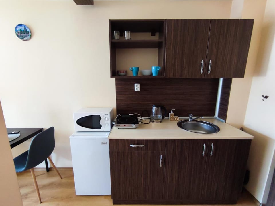 Kitchen or kitchenette, microwave