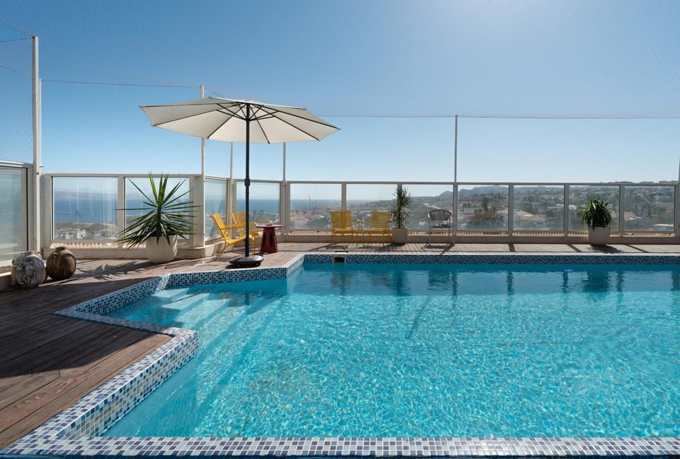 Patio, Day, Natural landscape, Mountain view, Pool view, Swimming pool, sunbed