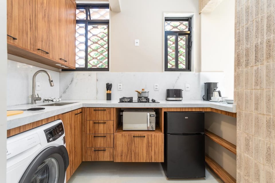 Kitchen or kitchenette, microwave, minibar, toaster, washing machine, kitchen