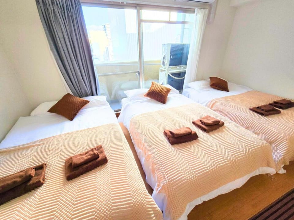 難波ゲストハウス Apartment in Osaka