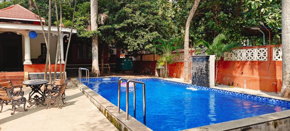 Property building, Day, Pool view, sunbed