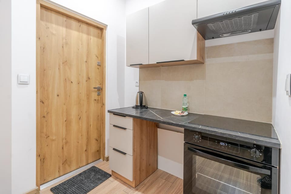 Kitchen or kitchenette, oven