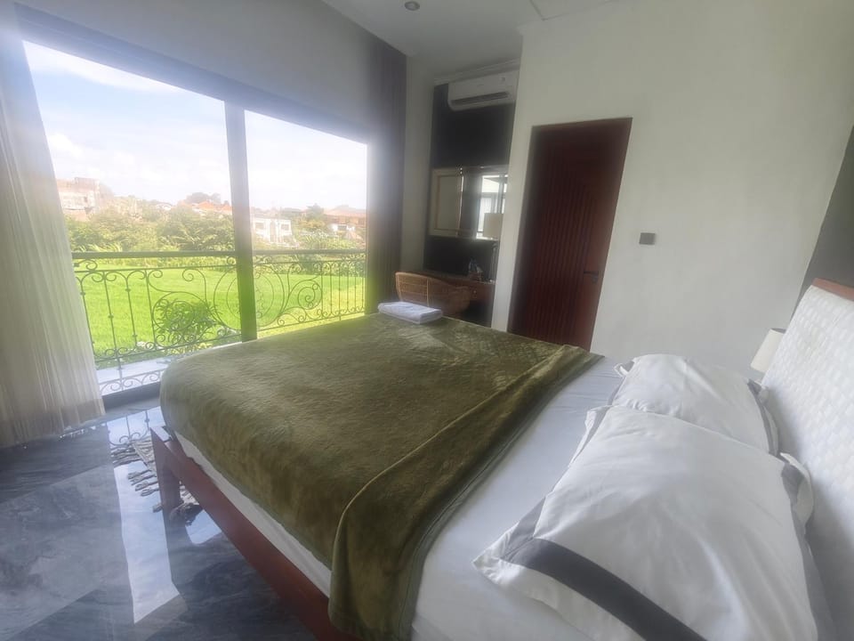 Santo Guesthouse Bed and Breakfast in North Kuta