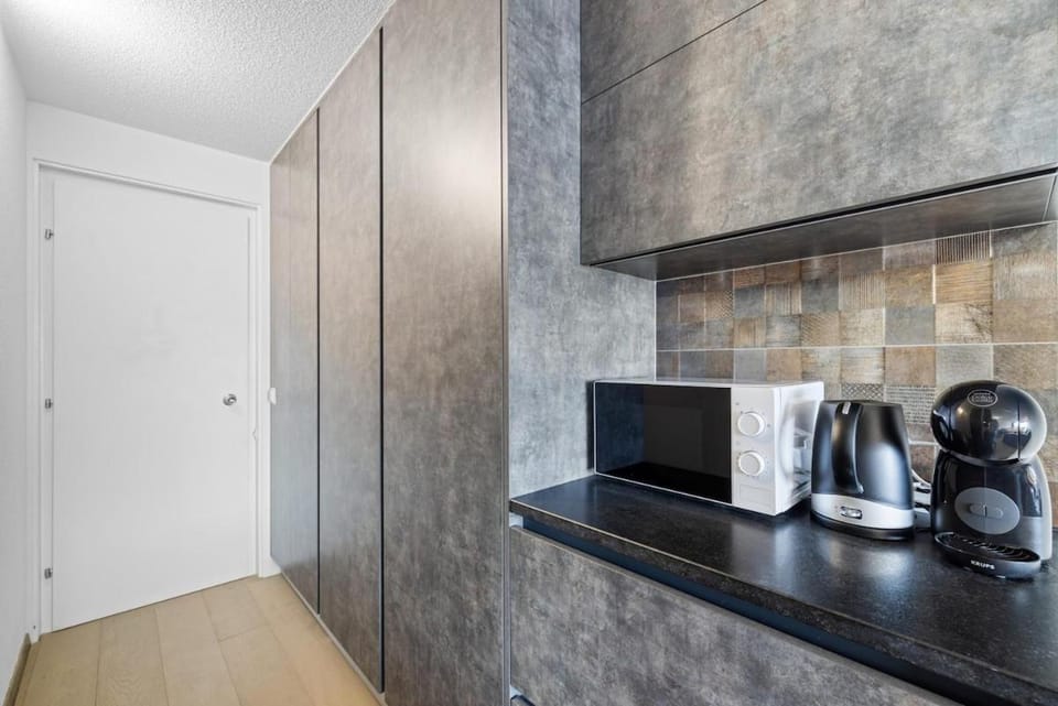 Facade/entrance, microwave, wardrobe