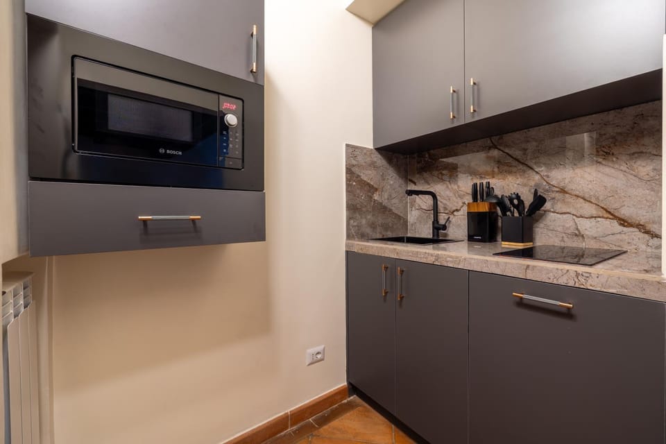 Kitchen or kitchenette, stove