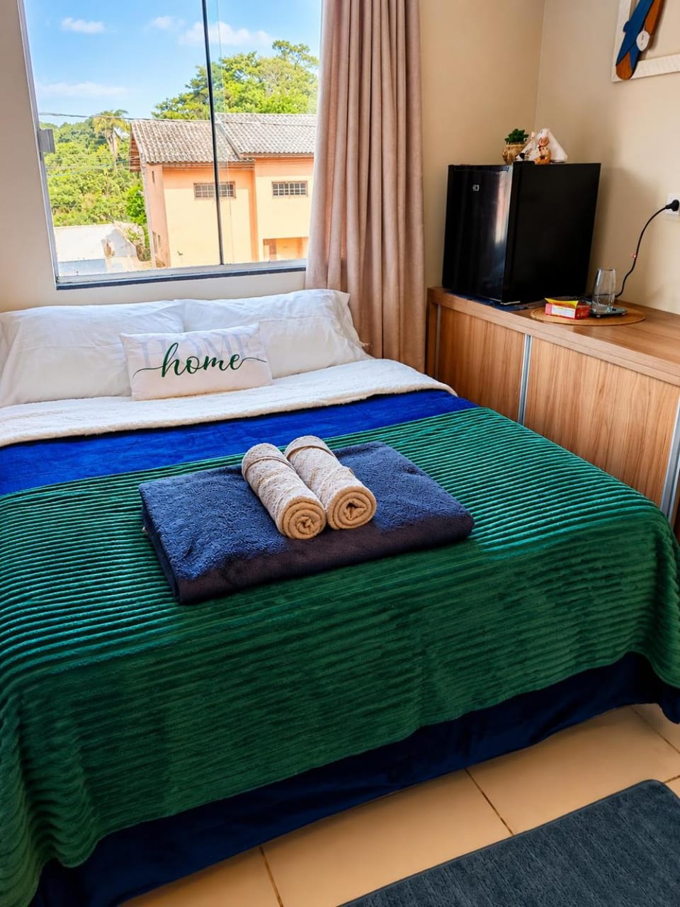 Quarto confortável em residência Familiar - WiFi - Netflix -Frigobar próx ao Aeroporto Apartment in Navegantes