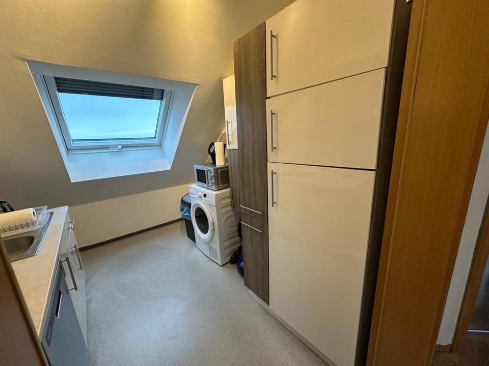 Kitchen or kitchenette, microwave, dryer