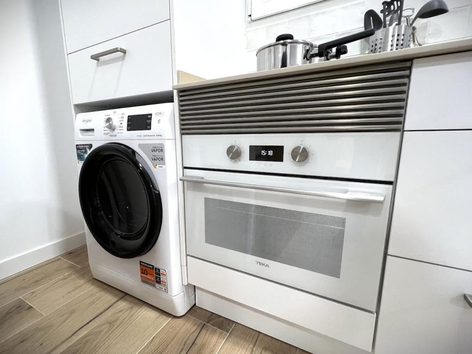 Kitchen or kitchenette, washing machine