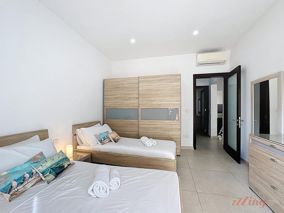 Bed, Bedroom, towels, wardrobe, air conditioner