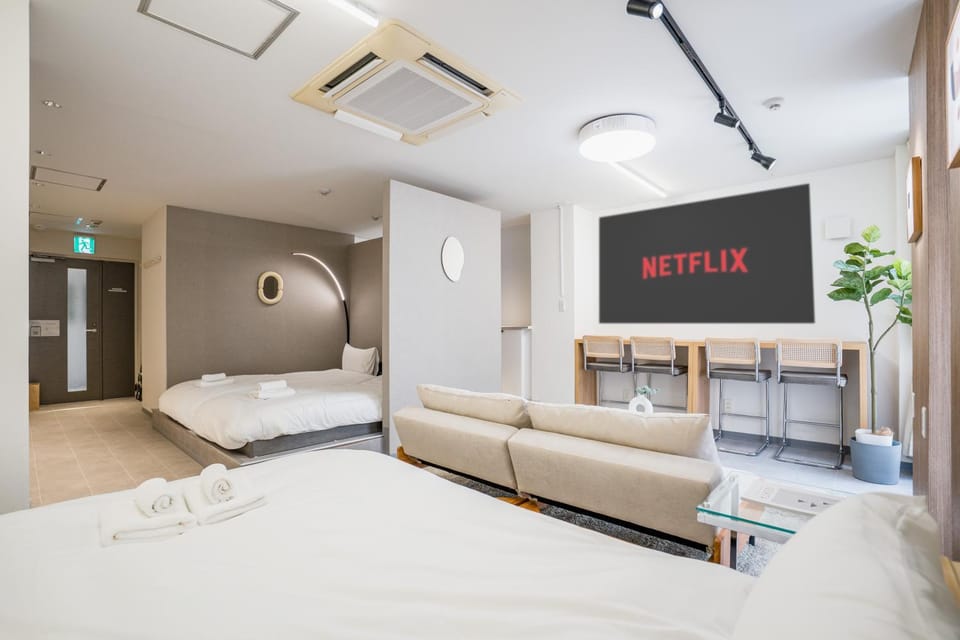 Bed, Living room, Seating area, Bedroom, air conditioner