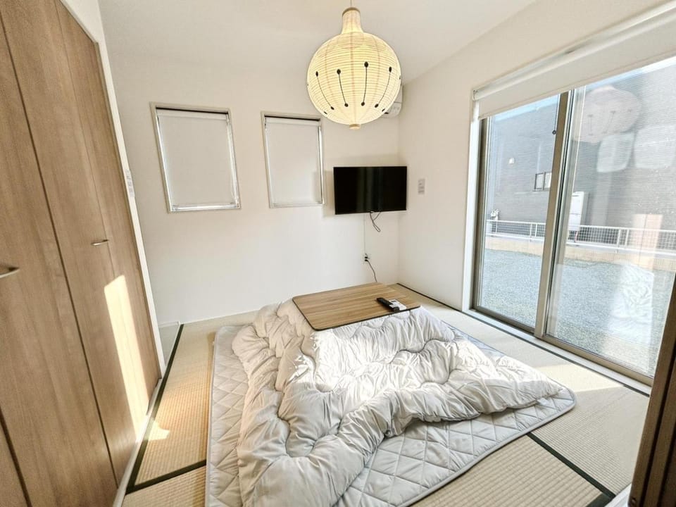 Convenient Ozu Location Bright 4BR Stay by Restavio Apartment in Japan