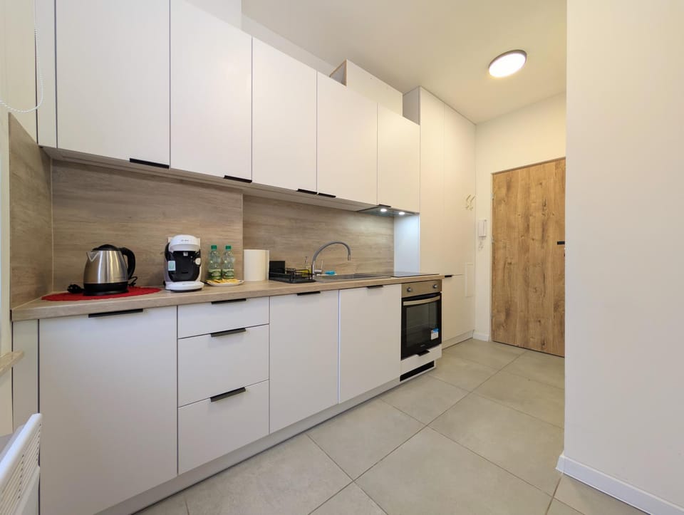 Kitchen or kitchenette, oven, stove