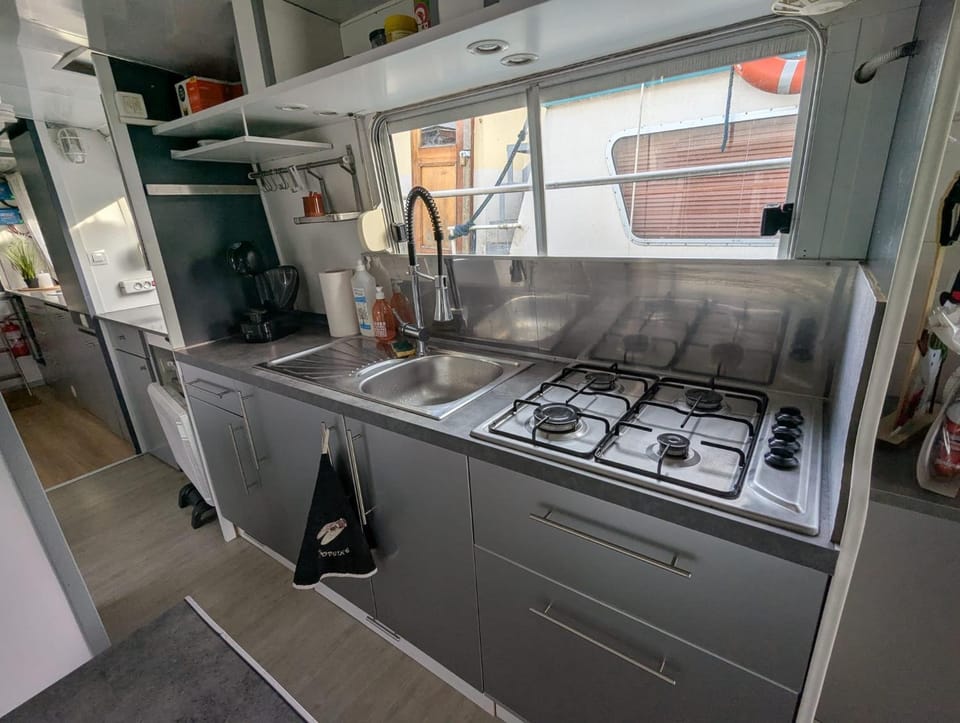 Kitchen or kitchenette, stove