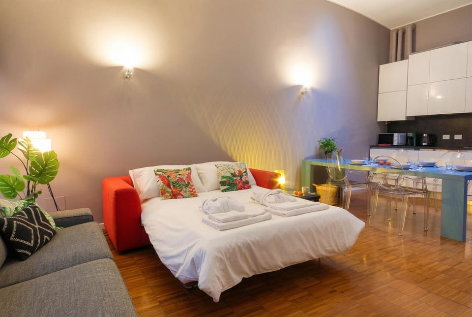 Bed, Kitchen or kitchenette, Living room, Seating area, towels