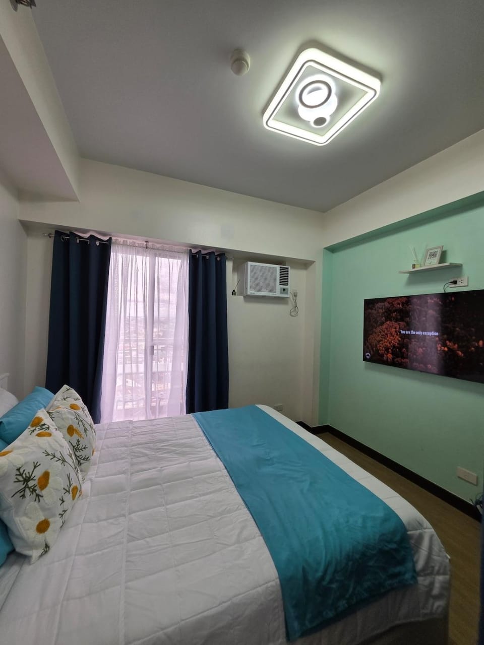 Minimalist Apartment with Queen size Bed at The Celandine Apartment in Quezon City
