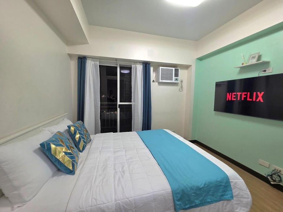 Minimalist Apartment with Queen size Bed at The Celandine Apartment in Quezon City