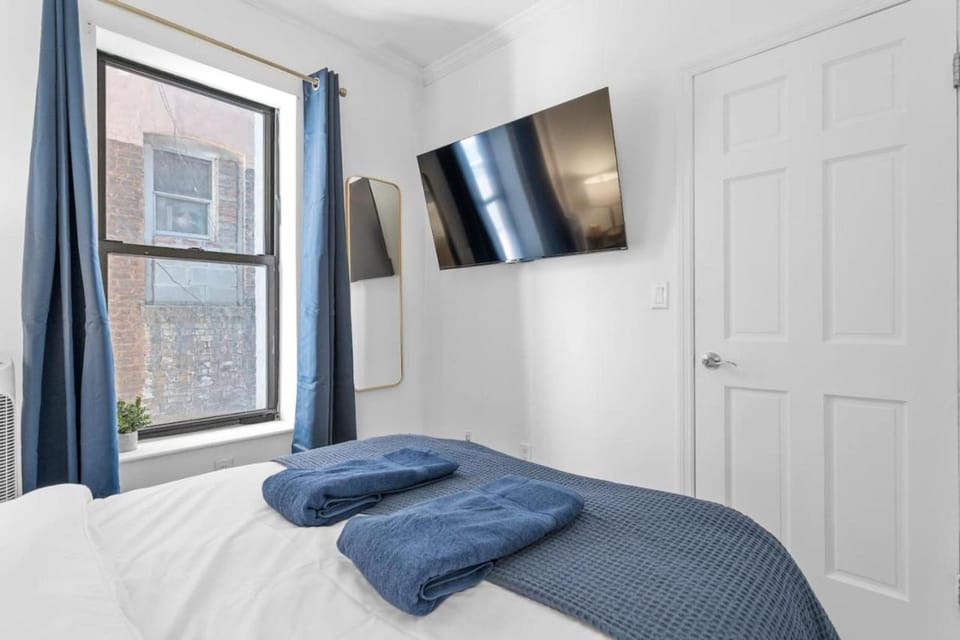 Chic East Village 1BDR Fast WiFi New Bathroom Netflix Discounts for Long Term Stays Apartment in East Village