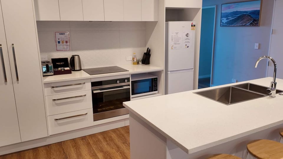Kitchen or kitchenette, oven, stove