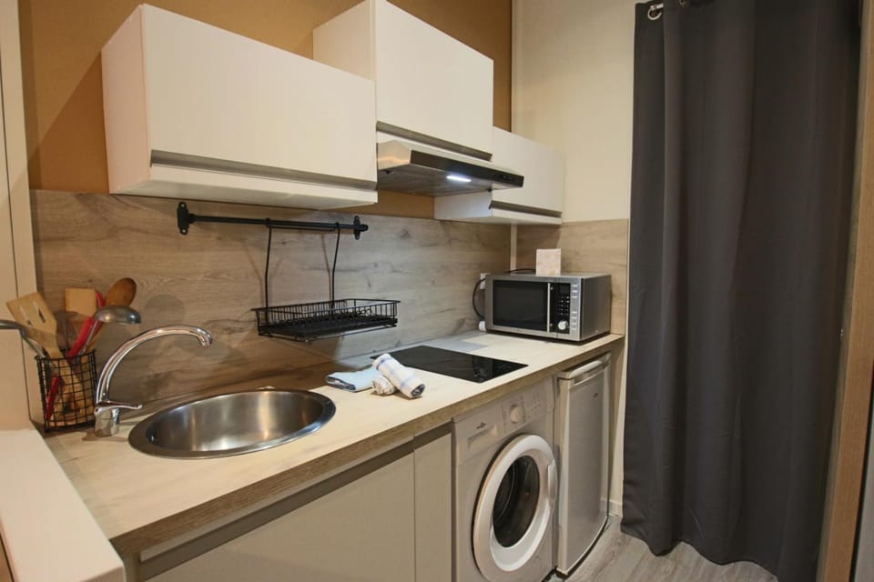 microwave, washing machine, kitchen