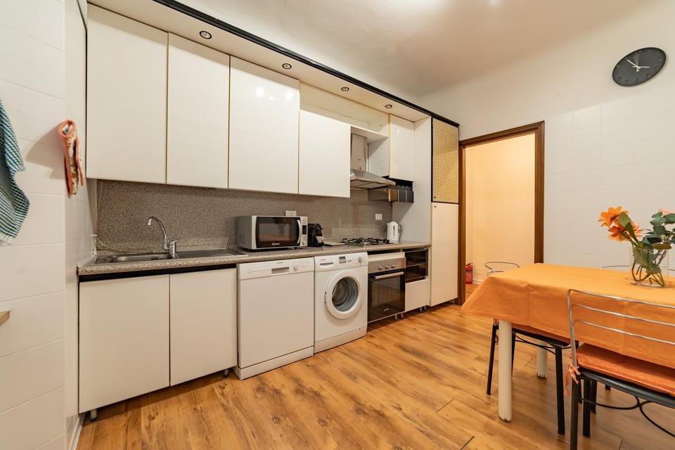 Kitchen or kitchenette, microwave, oven, washing machine, kitchen