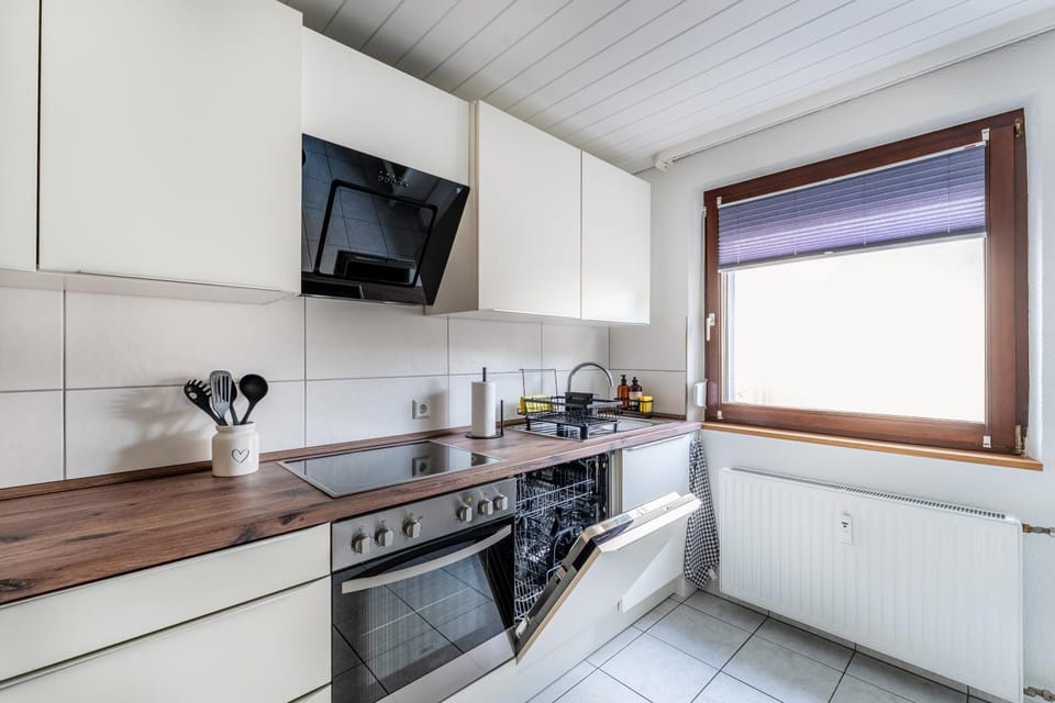 Kitchen or kitchenette, dishwasher, oven, stove, toaster