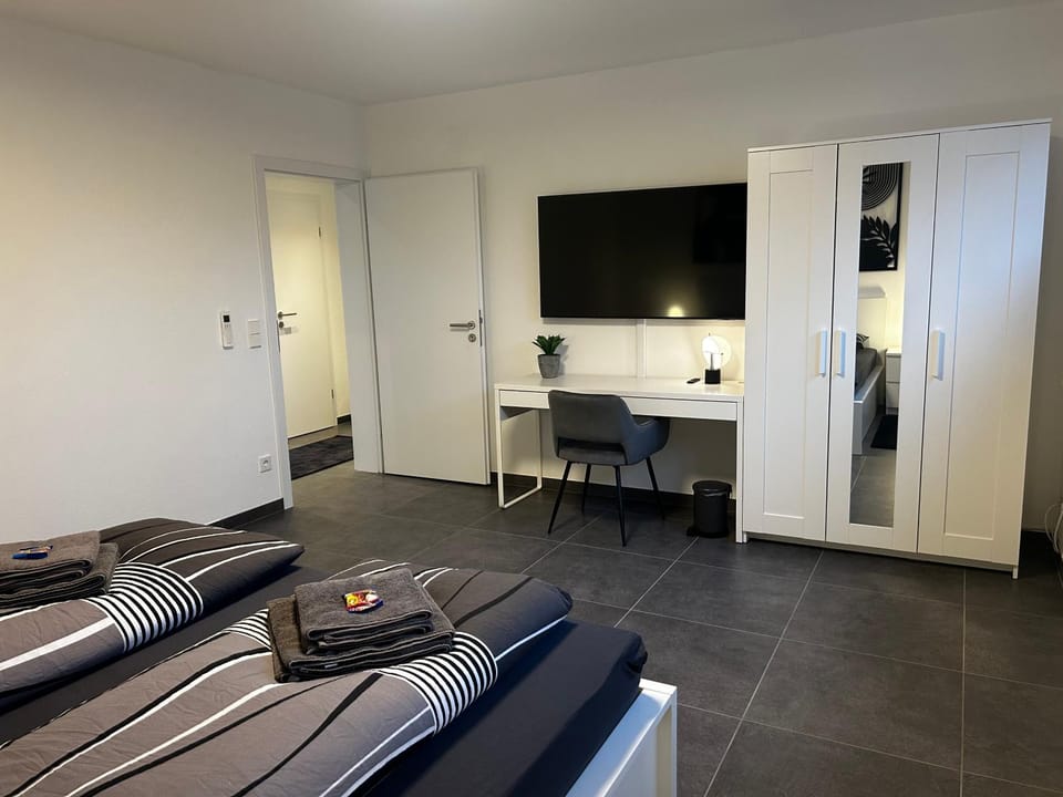 Bed, TV and multimedia, Bedroom, towels, wardrobe
