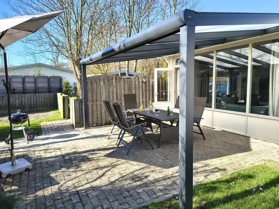 Property building, Patio, BBQ facilities, Garden, Dining area