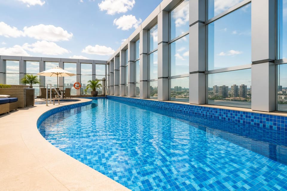 Property building, Day, Pool view, Swimming pool, sunbed