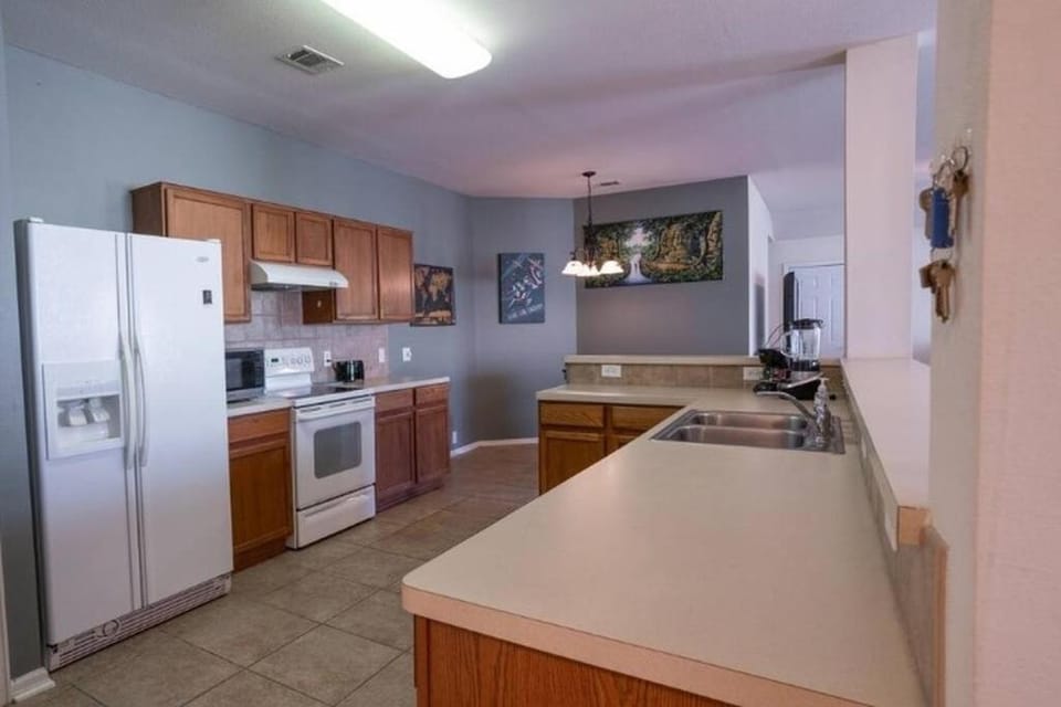Kitchen or kitchenette, dishwasher, oven, stove, toaster