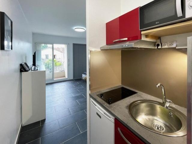 Kitchen or kitchenette, stove