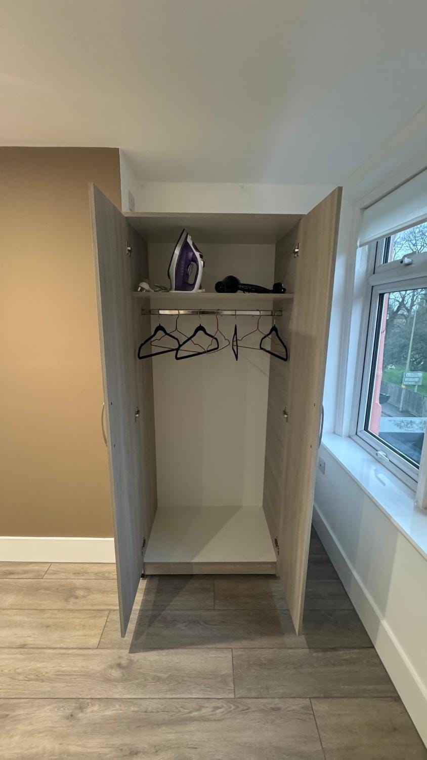 flat iron, furniture, hair dryier, wardrobe