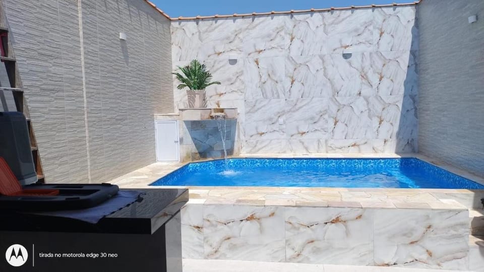 House piscina lugar maravilhoso House in Itanhaém