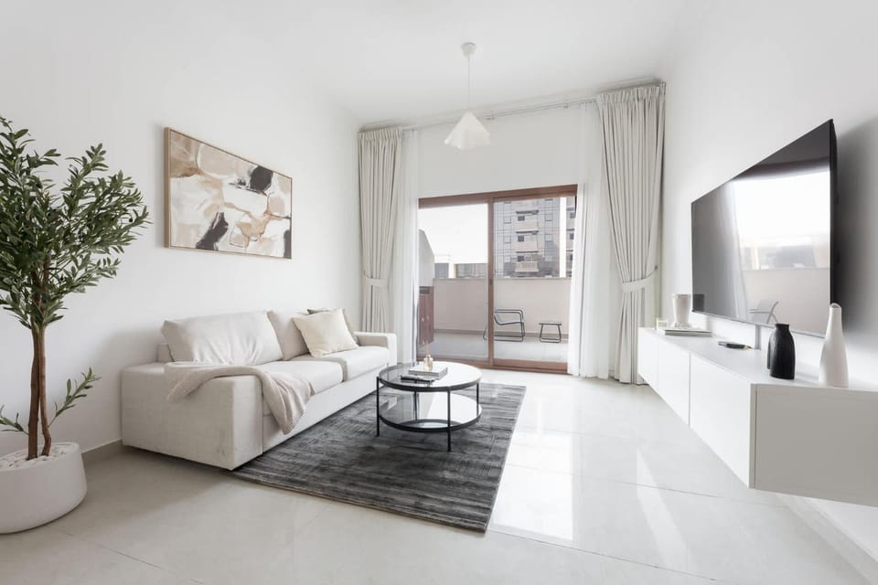 Free housekeeping visits during your stay - StayShort - Spacious JVC Apartment with Large Balcony Sleeps 4 Apartment in Dubai