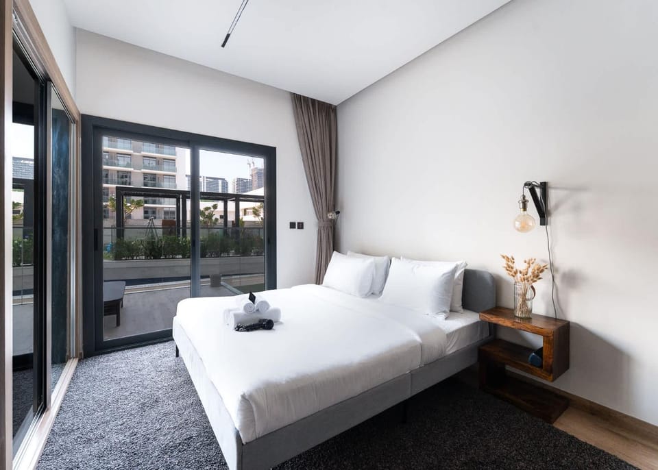 Free housekeeping visits during your stay - StayShort - JVC Apartment with Private Balcony Sleeps 4 Apartment in Dubai