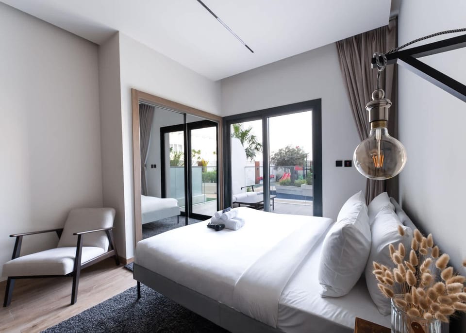 Free housekeeping visits during your stay - StayShort - JVC Apartment with Private Balcony Sleeps 4 Apartment in Dubai