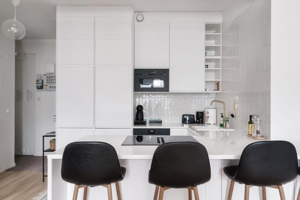Seating area, Dining area, oven, stove, toaster, washing machine, kitchen