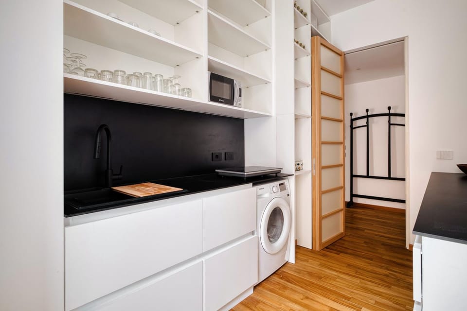 Kitchen or kitchenette, dishwasher, stove, washing machine
