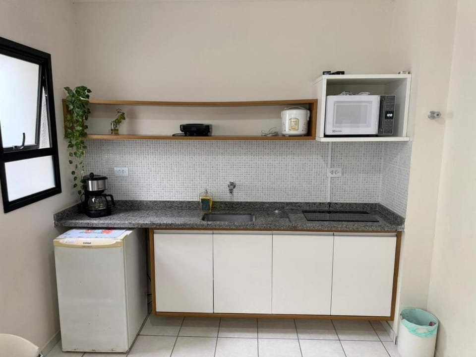 Apartamento no Centro 150 metros da praia com piscina e estacionamento incluso Apartment in Caraguatatuba