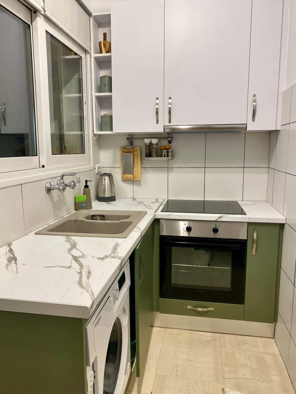 Kitchen or kitchenette, stove, washing machine